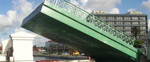Applications for pultruded FRP products include pedestrian bridges, AASHTO HS-25 bridge superstructures, as well as decks and guardrails.